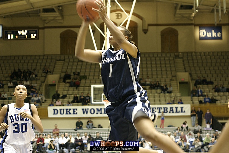 Carrem Gay trails the break as Tyra Grant goes for the layup.