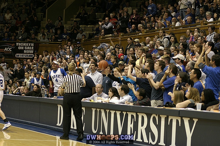 Official Sally Bell gets the ball back from the Cameron fans