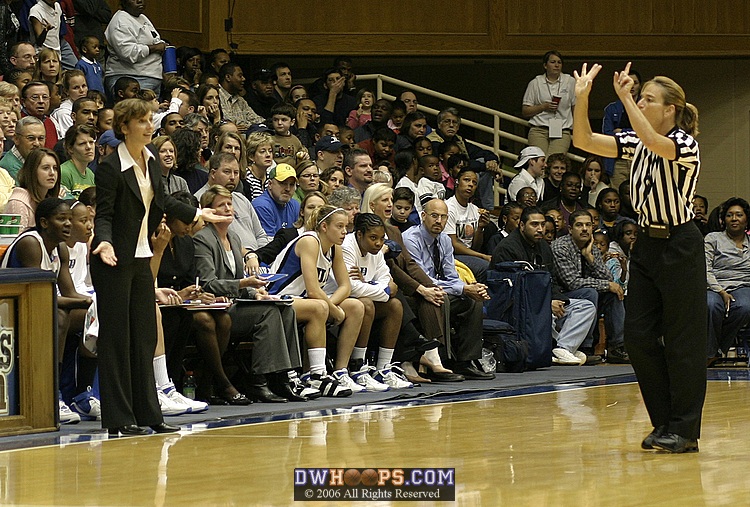 Referee Carla Fountain makes a call that Gail Goestenkors can't believe