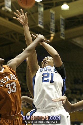 Joy Cheek is fouled in the act by Tiffany Jackson