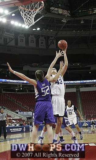 Ali puts up a miss over Kaitlin Foley