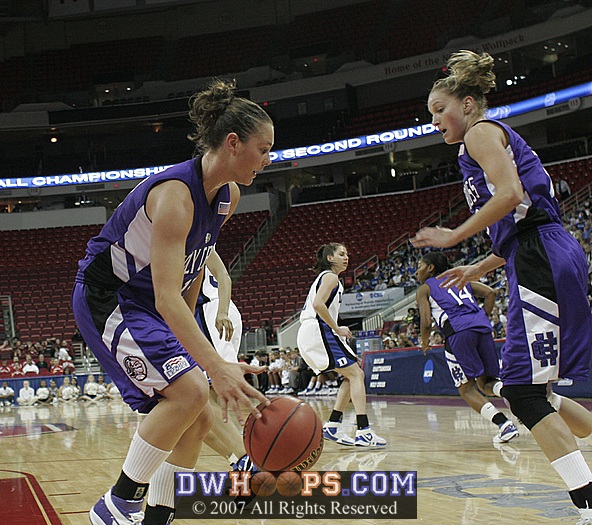 Ashley McLaughlin corrals a rebound for the Crusaders
