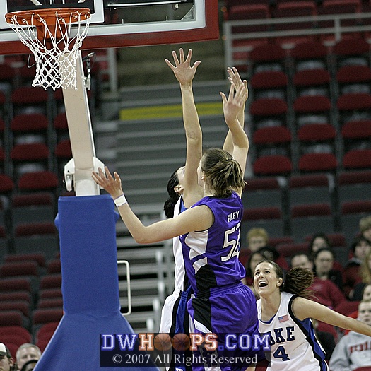 Kaitlin Foley shoots over Alison...