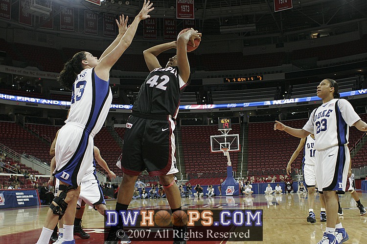 Ali turns Lady Comfort's jumper into a fallaway miss...