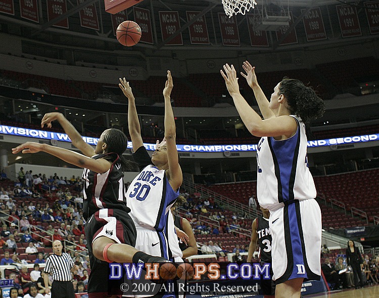 ...but Shenita Landry swats the ball away.  Temple had 6 offensive boards in the first 5 minutes, but only 13 overall.