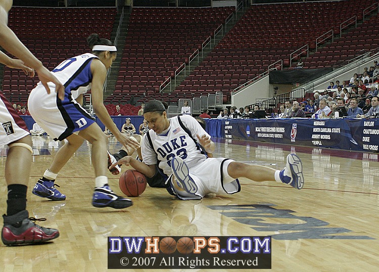 Wanisha Smith hits the deck for a loose ball...