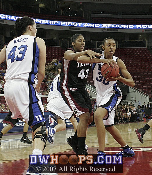 Carrem Gay steals the ball from Lady Comfort