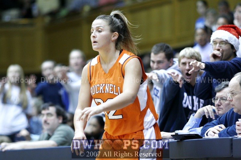 Lauren Schober inbounds after the opening tip was knocked OB