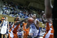  - Kristina Collymore gets a hand on the ball, but is unable to prevent Joy Cheek from scoring on a layup