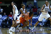  - Keisha Champion tries to keep the handle against Jasmine Thomas
