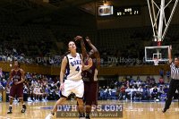  - With the shot clock winding down, Shanise Blanks tries a three pointer