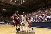 Jasmine Thomas drives to the basket against Alysha Marvin -  - 