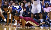 Thomas and Monroe hit the floor for a loose ball -  - 