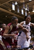 Cayla Moore and Joy Cheek struggle after a Waner miss.  Shante Williams got the board. - 26-18 - 3:14 1st