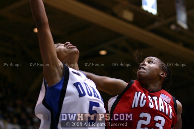 Shayla Fields rejecting Jasmine Thomas' layup