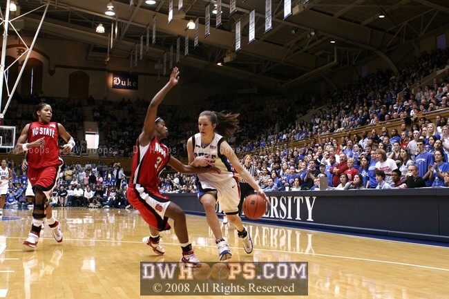 Abby Waner, driving and fouled by Sharnise Beal
