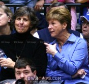 Jackie Silar and Debbie Leonard, who battled Coach Yow many times back in the day, share a moment during the timeout -  - 