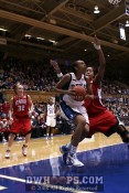 The defense of Khadijah Whittington forces Carrem Gay to the baseline - 24-18 - 4:51 1st