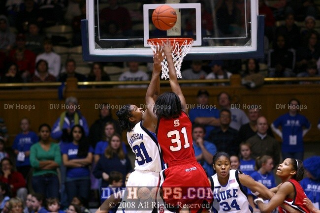 Sharnise Beal puts in a jumper over her numerical counterpart Keturah Jackson