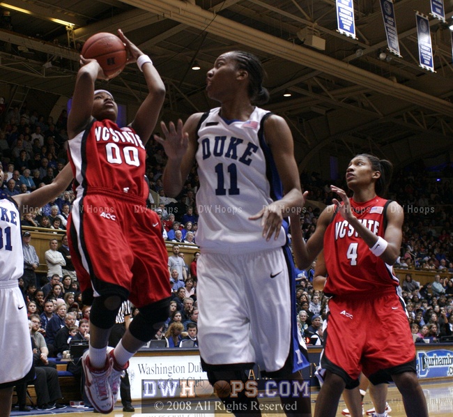 Amber White tries to stem the Duke tide with a hoop