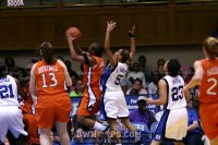 Andrea Barbour, wearing a brace to keep her shoulder located, score a fast break layup - 3-6 - 17:07 1st