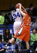 Junior Brittany Cook ties up Krystal Thomas.  She had an outstanding night including her first ever double double. - 70-44 - 5:48 2nd