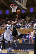 Brittany Waters times her layup to avoid the shot blocking of Chante Black - 38-20 - 19:10 2nd