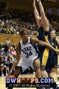  - Krystal Thomas drives to the basket...