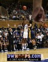  - As the ref in front of me counts to three, Karima Christmas attempts a three pointer
