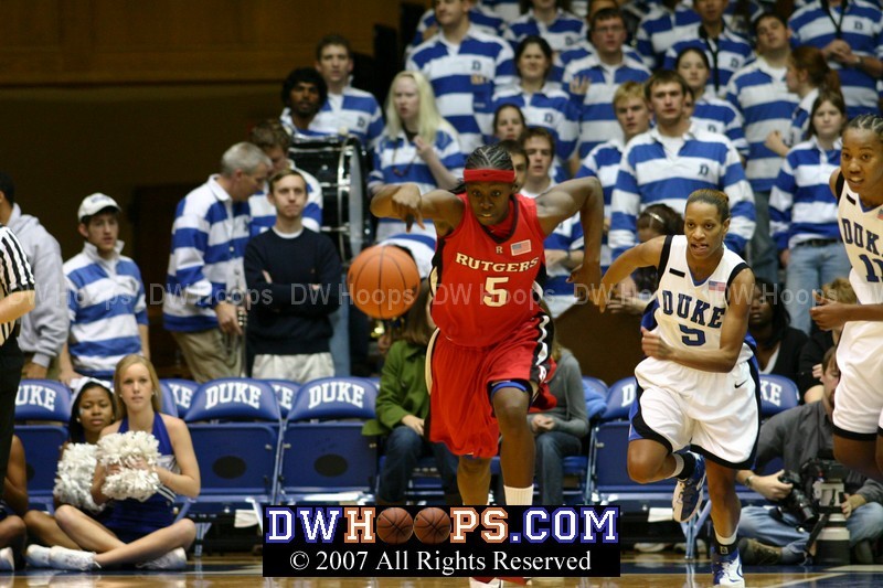 Essence Carson leads the Rutgers break as Jasmine Thomas and Chante Black give chase