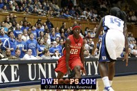  - Rutgers' Matee Ajavon takes the dribble between her legs...