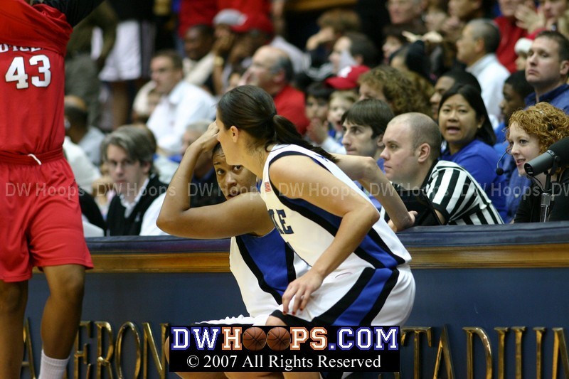 Joy Cheek and Abby Waner wait to re-enter the game