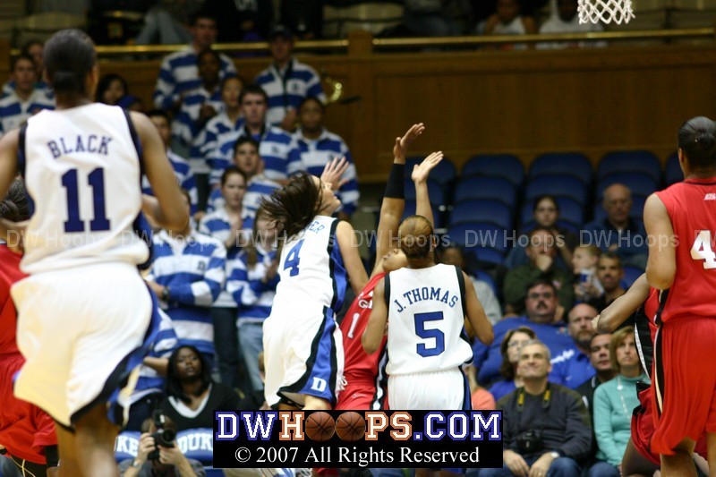 Abby Waner is fouled while making a layup that proved to be her lone basket of the night