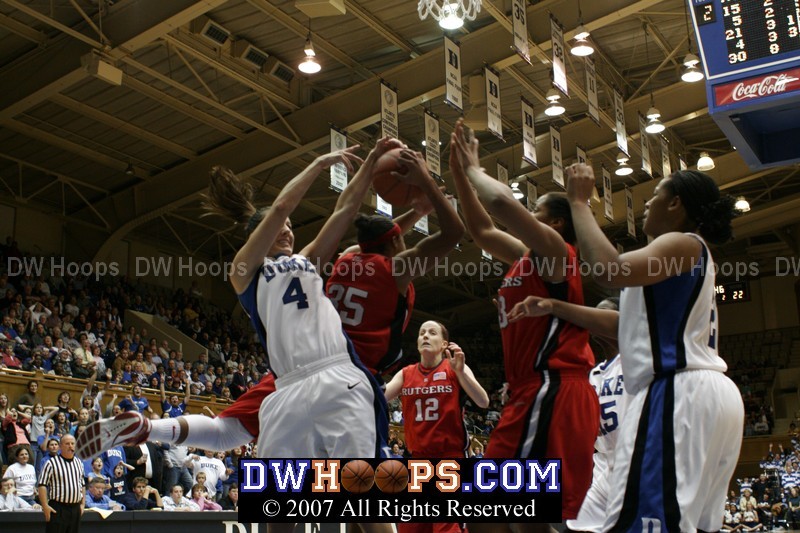 Trying to rebound a Jasmine Thomas miss, Abby Waner is whistled for her fourth personal foul