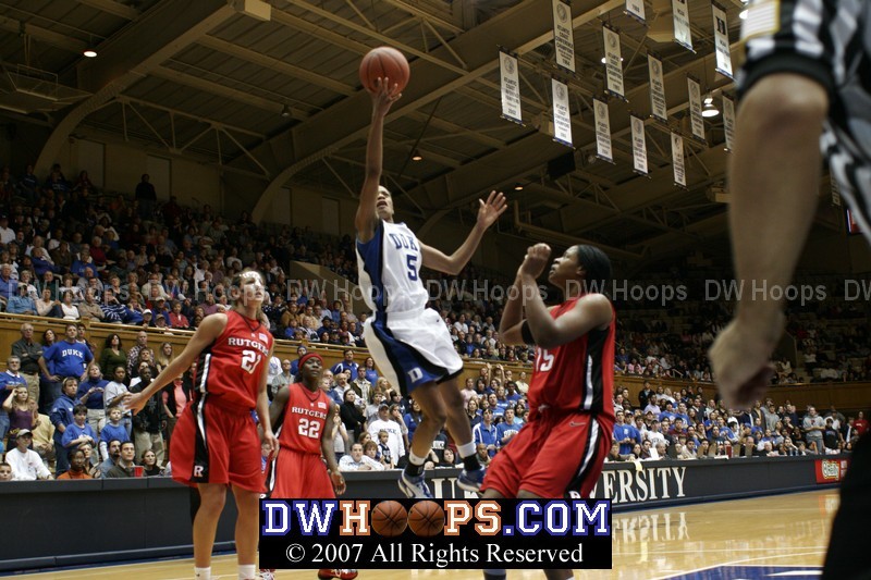 Jasmine Thomas converts a runner and is fouled, but Duke still trails