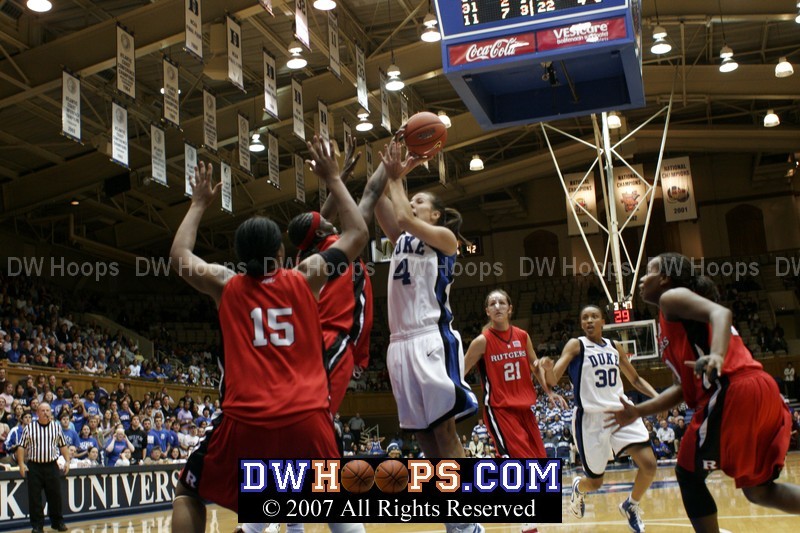 After an offensive rebound, Abby Waner is fouled by Essence Carson
