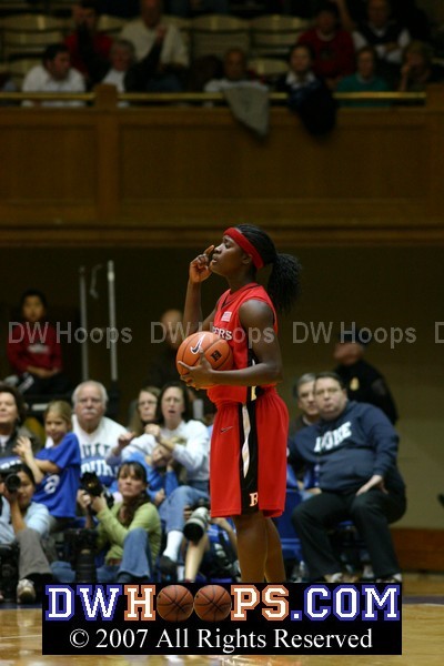 Matee Ajavon tries to get the stagnant Rutgers half court offense to move - they'd eventually take a time out