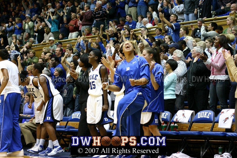 Wanisha Smith and the Duke bench erupt as KJ rebounds a Brittany Ray miss, icing the game