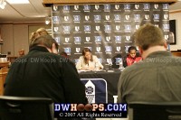  - Solemn looks from Coach Springer and her team in the interview room