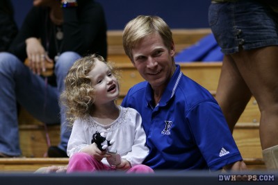 In the stands, Duke Associate Women's Soccer Coach Billy Lesesne and his daughter -  - 