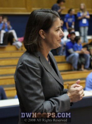 Coach McCallie takes the floor, seeing her former player Cindy Blodgett on the Maine sidelines -  - 