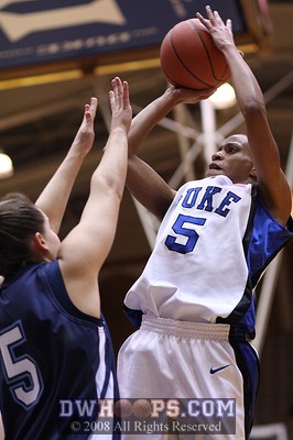 Jasmine Thomas attempts a jumper in the lane