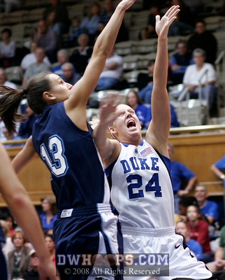 Kathleen Scheer scores on a layup. -  - D24;2, 8:37, 80-20
