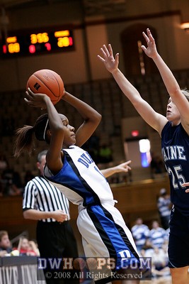 Chelsea Hopkins back in the game, under extreme defensive pressure from Tewksbury, about to pass to Bridgette Mitchell -  - D1.O25;2, 3:55, 88-28
