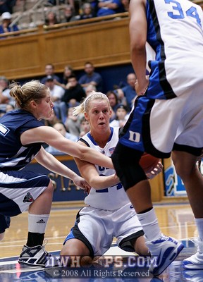 A spectacular play: after boarding her own miss, Scheer passes from her knees to Krystal Thomas as Tewksbury reaches in. -  - D24.O15;2, 2:50, 88-29