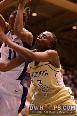 The physical play of Chante Black and Mo Bennett underneath Duke's basket -  - 
