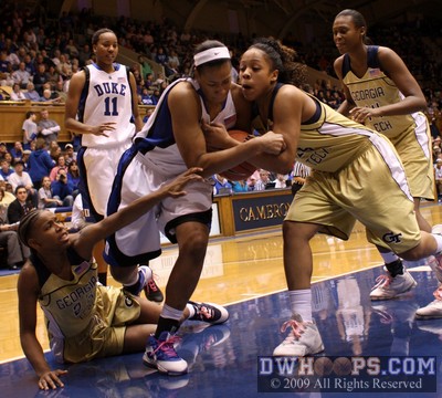 Joy Cheek and Iasia Hemingway struggle for possession under Tech's basket -  - 