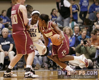 Brittany Johnson dribbles Bridgette Mitchell into a screen of Swords -  - O30.D15.O22;