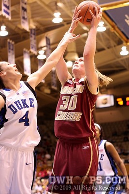 Abby Waner can't stop the shot of 6'6" Carolyn Swords