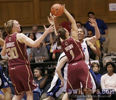 Ayla Brown wrests the ball away from Chante Black in the paint as BC chipped away at Duke's lead -  - D11.O1;2,10:22,52-38
